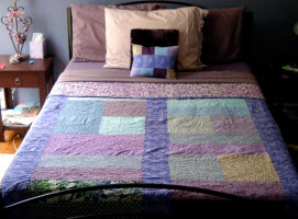 A finished quilt finds its way home.