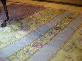 A close-up of the longarm machine. Stitching away happily...